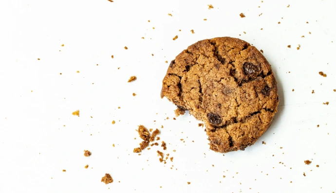 brown round cookie on white surface